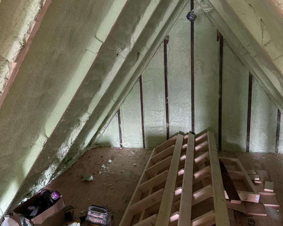 Spray-applied insulation in an attic