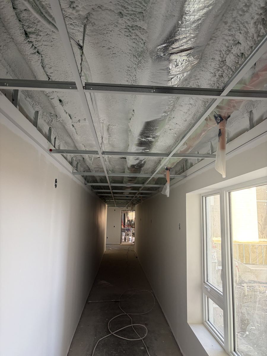 Overhead work and services in an interior at Ocean View, Nanaimo